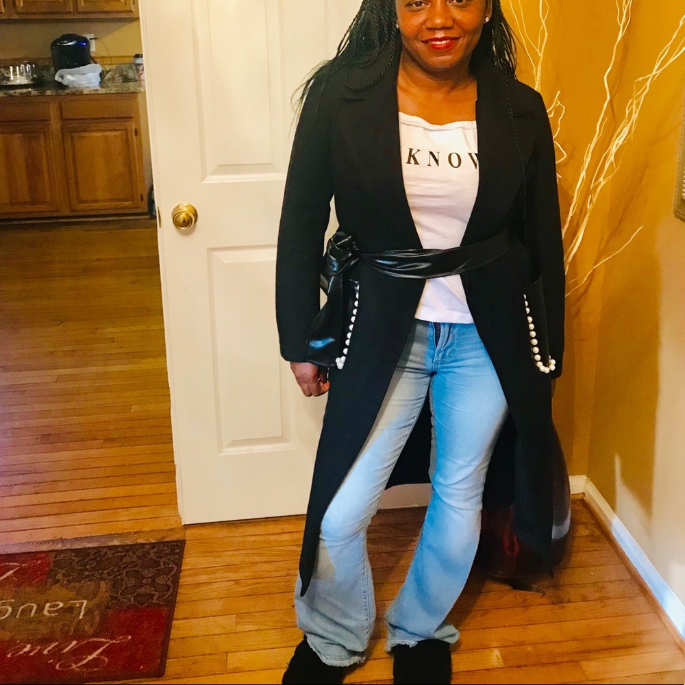 Wool coat.... pearl pockets....